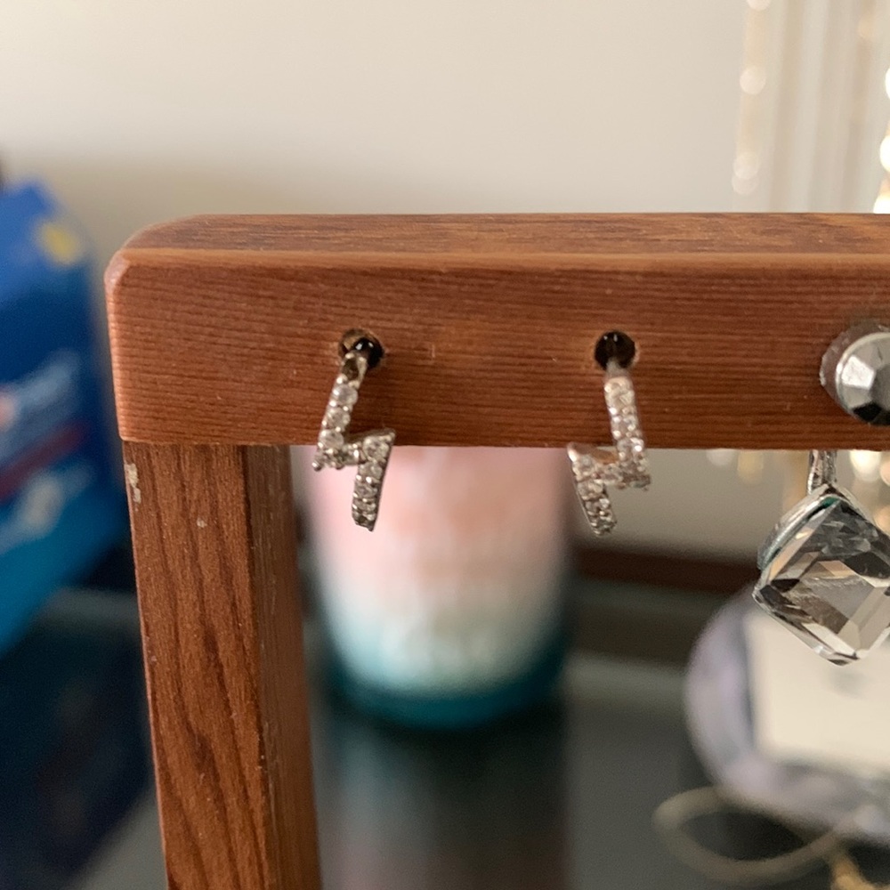 Lightning shaped earrings.